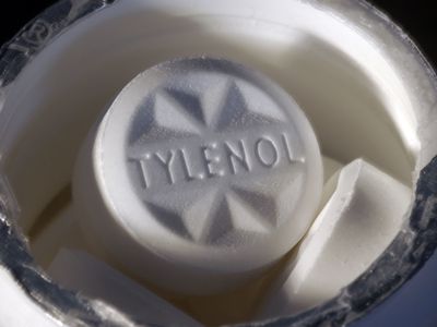 close up of tylenol tablet