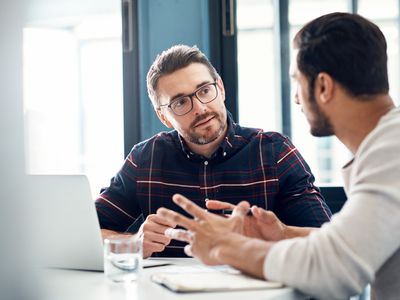 Businessmen having a discussion in an office