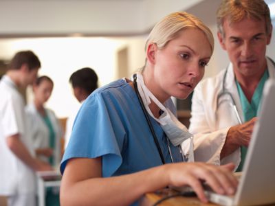 doctors using laptop