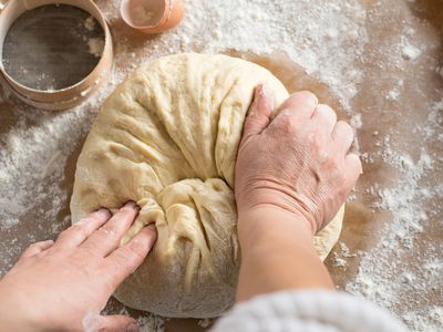 Person kneading dough