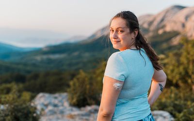 woman with continuous glucose monitor