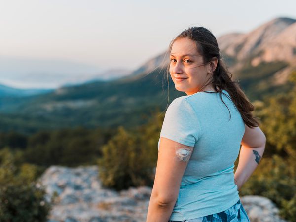 woman with continuous glucose monitor