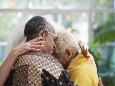 senior women hugging