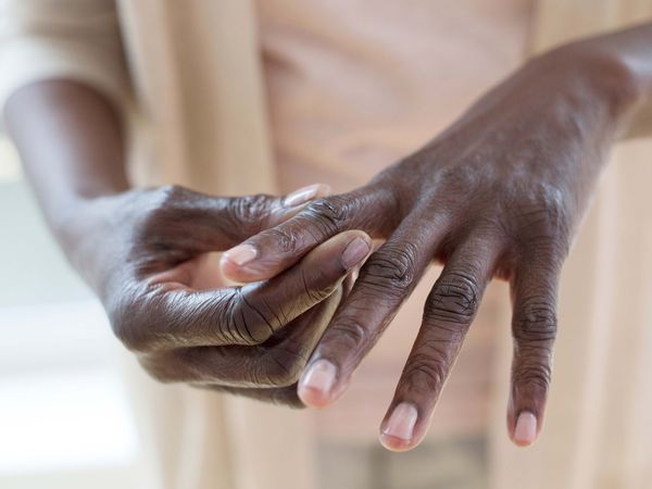 woman with finger pain