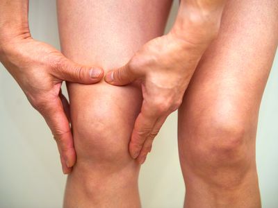 closeup of woman with knee pain