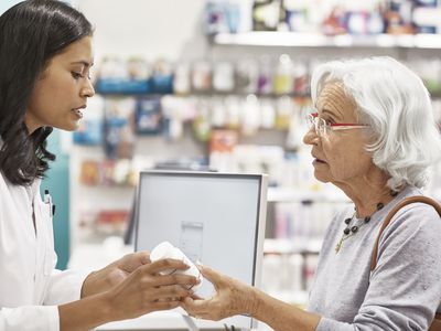 elderly woman shopping for medications