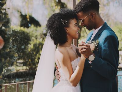 Bride and groom dancing together