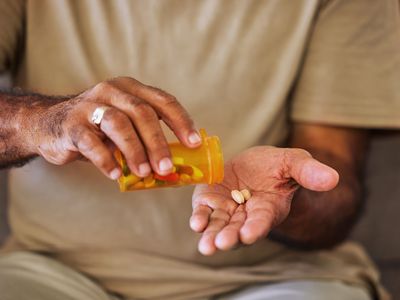 man holding medication