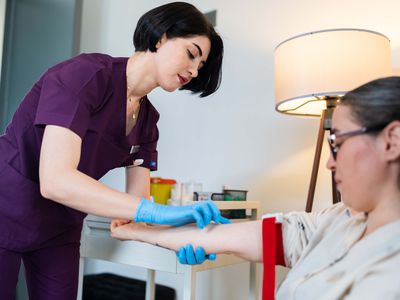 woman getting blood drawn