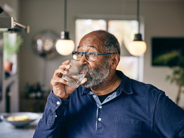 man drinking water