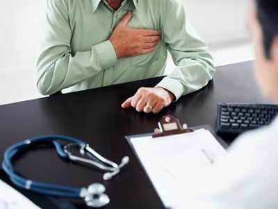 Man consulting doctor about heart problems