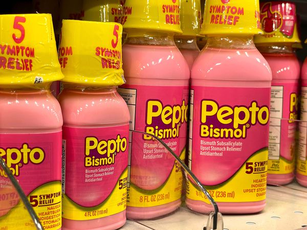 bottles of pepto bismol on the shelf