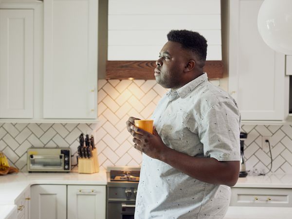 obese man thinking about his health