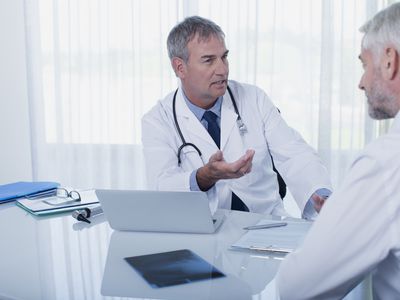 male doctor with male patient