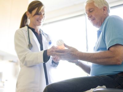 Doctor discussing prescription drugs with patient