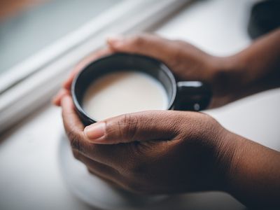 Warming cold fingers on warm mug