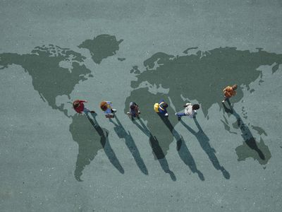 Group of young adults, photographed from above, on various painted tarmac surface, at sunrise.