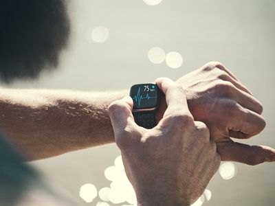 A photo of a smartwatch with heart rate monitor