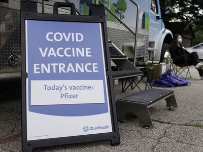 COVID vaccine sign