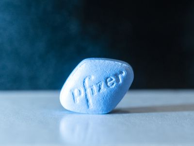 A close-up of a blue Viagra tablet