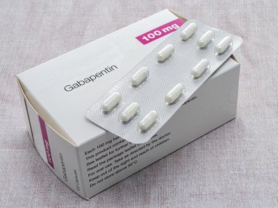 A box of generic gabapentin pills with tablets in pill pack on top