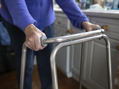 older adult using a walker