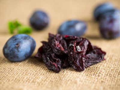 Dried prunes and fresh plums