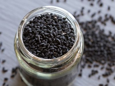 Nigella sativa (black cumin) seeds in a glass jar